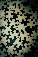 jigsaw puzzle on wooden background. to represent how complexity in game and challenge. plan and...