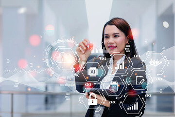 Businesswoman pointing at using cloud technology virtual interface and manage online business according to their network with technology
