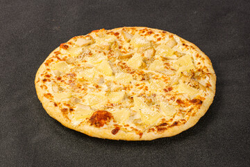 Pizza with chicken and pineapple