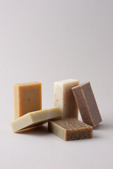 Soap on grey background. Close up, copy space