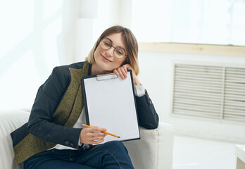 pretty woman sitting in office work recording professionals