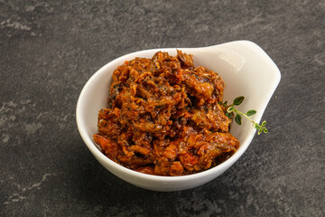 Canned anchovy in tomato sauce