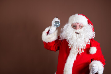 Detective Santa Claus with a flashlight.