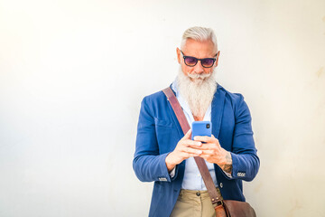 Senior man with a phone