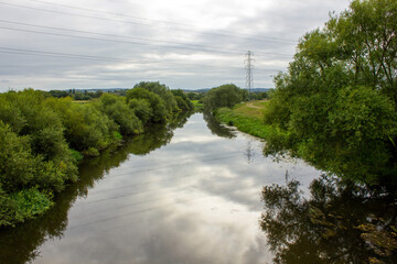 Obraz premium the river bank reflections
