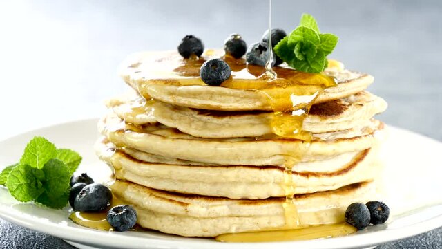 stack of pancake with syrup