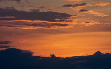 the twilight with clouds on orange sky background