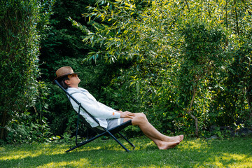 person relaxing in the garden