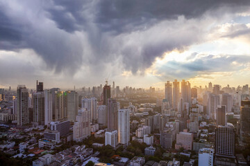 view of cityscape downtown with cloud overcast over sky on sunny day