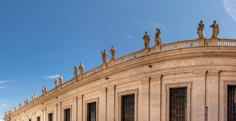 Fototapeta na wymiar the apostles as statues at the balcony of st. Peters colonnades in the Vatican, Rome