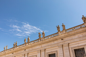 the apostles as statues at the balcony of st. Peters colonnades in the Vatican, Rome
