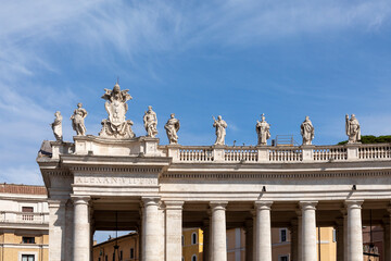 Fototapeta na wymiar view to the Colonnades at St. Peter's square in the Vatican, Rome with inscription Alexan - engl: Alexander