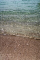 crystal clear transparent seawater turquoise tropical water in sunny day sand beach
