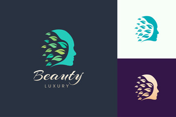 Beauty logo with face and leaf shape for cosmetic and skin care brand