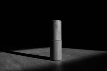 monochrome picture wood tube on black abstract background