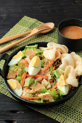 Gado-Gado, Indonesian Traditional Food Mix Vegetable Salad Served with Peanut Sauce, Popular in Jakarta. Usually Served with Lontong (Indonesian Rice Cake).