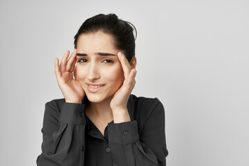 Fototapeta na wymiar woman in black shirt holding her head depression migraine