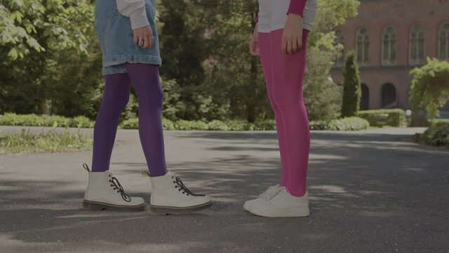 ideo where only the legs of the girls are visible. Video of the legs on which it is clear that the kiss took place.