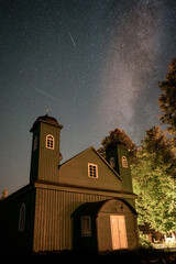 Perseid meteor shower and Milky Way above a mosque in Kruszyniany
