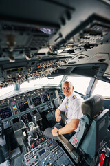 Joyous male pilot showing his readiness for take-off © Svitlana