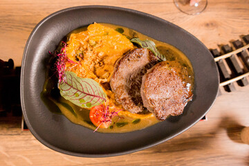 Meat steak on a plate with mashed potatoes