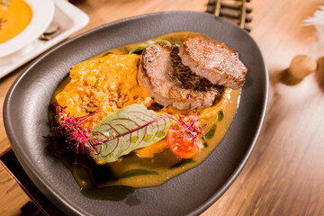 Meat steak on a plate with mashed potatoes