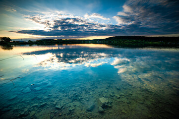 Beautiful calm lake with sunset