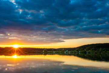 Beautiful calm lake with sunset