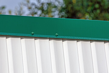 A fragment of the cornice of the roof of the house close-up