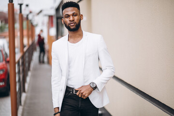African american man in white jacket