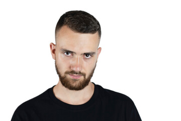 Obraz premium Portrait of a young man with a beard and mustache on a white background in a dark T-shirt, a man a little angry, he had a hard day at work and a headache from making serious decisions