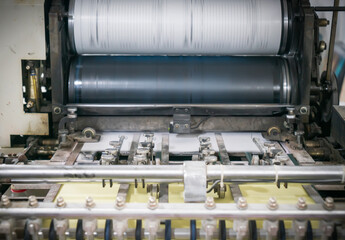 The offset press in the production process in the printing factory