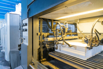 The offset press in the production process in the printing factory