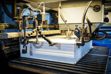 The offset press in the production process in the printing factory
