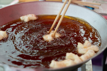 closeup make Youtiao, deep-fried doughstick, Patongo