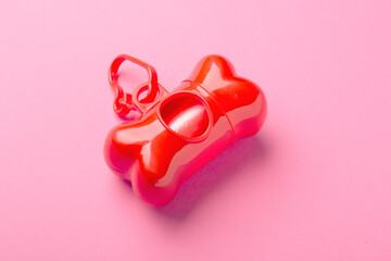 Dog cleaning package. Case for storing packages in the form of a red bone. Animal cleaning.