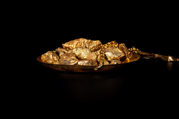 Gold concept, close-up of large gold nuggets
