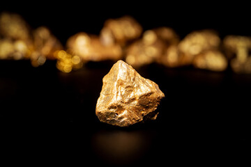 Gold concept, close-up of large gold nuggets