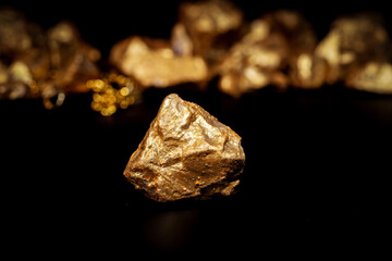Gold concept, close-up of large gold nuggets