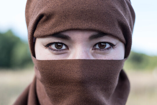 An Afghan woman in a hijab, close-up. The seizure of power. The Taliban.