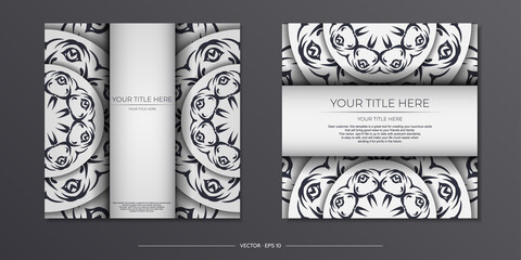 Stylish white postcard design with vintage patterns. Stylish invitation with dewy ornament.