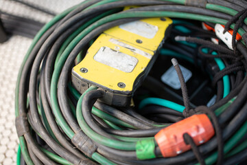 A view of a wrapped heavy-duty electrical lighting cable. 