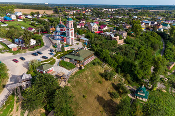 Tourist area around the temple in the old village of Rusinovo, panoramic aerial view, Ermolino...