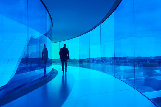 Blue City views across Denmark, Minimal Ultramodern Interior, Smart Urban Architecture, Colour Psychology, Functional Design. Suited Man, Inspiring Office Space, Event Venue, Art Museum, 