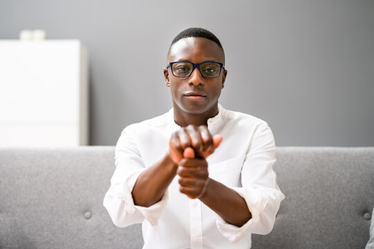 Young African Man Using Sign Language