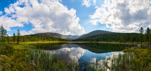 Mountain lake on a summer sunny day.