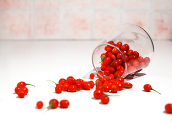 Fresh Goji berries in transparent glass. Healthy antiage superfood.