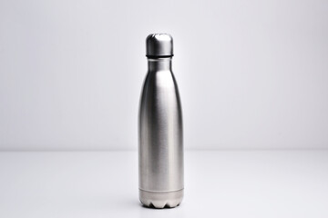 Stainless thermos water bottle, isolated on white background. Silver color. Blank stainless steel...