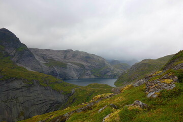 Munkebu hut hiking trail during arctic summer in mountains of Lofoten, Norway