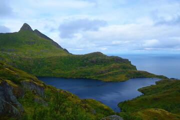 Munkebu hut hiking trail during arctic summer in mountains of Lofoten, Norway
